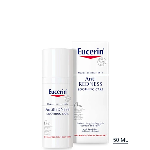 Image 1 - A white Eucerin AntiREDNESS Soothing Care bottle and box are shown against a white background, with text on the box reading Eucerin Clinically approved Hypersensitive Skin Anti REDNESS SOOTHING CARE 0% Preservatives Parabens Paraffins Fragrances Alcohol Colourants Emulsifier Instant, long-lasting skin comfort and relief with SymSitive* & Licorice Extract DERMATOLOGICAL SKINCARE 50 ML. Image 2 - Text displayed next to a woman holding a tube of cream reads KEY BENEFITS IMMEDIATE AND LONG-LASTING REDNESS RELIEF RESTORES SKIN COMFORT INTENSIVELY HYDRATES and the tube text Eucerin Hypersensitive Skin AntiREDNESS SOOTHING CARE 0% fragrances alcohol MEDICAL SK. Image 3 - A hand holds a white bottle of Eucerin Hypersensitive Skin AntiREDNESS Soothing Care 0% MEDICAL SKINCARE product, with icons and text on the right side indicating ANTI-REDNESS, SENSITIVE SKIN, and DAY & NIGHT use. Image 4 - A before and after image shows skin with reduced redness and capillaries over time with the text PROVEN RESULTS WEEK 0 BEFORE WEEK 4 AFTER* Clinical study with 55 women with sensitive to very sensitive skin, partly with rosacea and couperosis, 4 weeks of regular use. Individual results may vary.