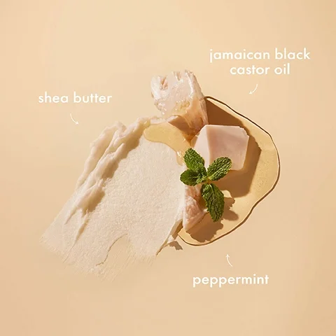 Image 1 - An arrangement of shea butter, Jamaican black castor oil, and peppermint leaves is displayed on a light beige background, with labels for each ingredient.