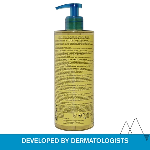 Image 1 - A tall yellow bottle with a blue pump dispenser is labeled Uriage Cleansing Oil Soap-Free Shower Bath Sensitive skin with Uriage Thermal Water from the French Alps Developed by Dermatologists. Image 2 - A close-up shows a hand and shoulder covered in foaming cleanser bubbles, with text overlays reading ALL SKIN TYPES - EVEN SENSITIVE, Foaming gel-in-oil cleanser, Soap-free, and Delightful fragrance. Image 3 - Image shows product features with icons and text including ADVANCED DERMATOLOGICAL FORMULA, GLYCERIN 25% Moisturizes & leaves a non-greasy protective film, GENTLE SURFACTANTS Gently cleanses, and URIAGE THERMAL WATER 100% pure & natural Softens & soothes all skin types. Image 4 - Infographic with icons and text on a mountain background including Dermatologically and ophthalmologically tested Suitable for sensitive skin Physiological pH (5,5) Soap-free. Image 5 - Image of a Uriage Cleansing Oil bottle with text CLEANSER WITH 25% GLYCERIN LEAVES A SOFT PROTECTIVE FILM PROTECTS SKIN FROM THE DRYING EFFECTS OF WATER URIAGE EAU THERMALE HUILE LAVANTE CLEANSING OIL PEAUX SENSIBLES SENSITIVE SKIN VISAGE CORPS FACE BODY TESTE SOUS CONTROLE DERMATOLOGIQUE URIAGE, LEAU THERMALE DES ALPES 500 ml e 17 fl.oz. Image 6 - A bottle of Uriage Eau Thermale Cleansing Oil with a blue pump and a spill of oil behind it Developed by Dermatologists Uriage Eau Thermale Huile Lavante Nettoie Nourrit Préserve du dessèchement Cleansing Oil Cleanses Nourishes Prevents dryness Peaux Sensibles Sensitive Skin Visage - Corps/ Face - Body Testé Sous Contrôle Dermatologique Uriage Leau Thermale des Alpes 500 ml e 17 fl.oz.
