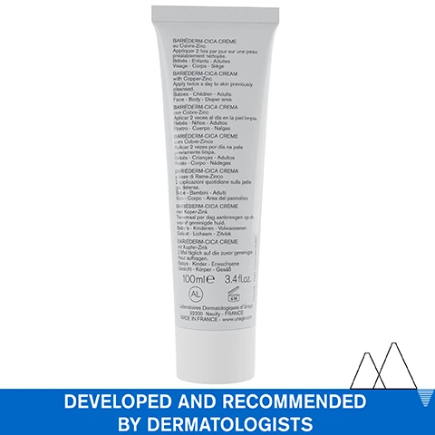 Image 1 - A white tube of Uriage BARIÉDERM-CICA CRÈME with Copper-Zinc 100mle 3.4fl.oz and text overlay DEVELOPED AND RECOMMENDED BY DERMATOLOGISTS. Image 2 - A hand applies thick white cream to skin with text reading Extra-rich repairing cream, Face & Body, DAMAGED, WEAKENED SKIN. Image 3 - Before and after images showing a scar on skin with text BEFORE, AFTER 21 DAYS, REPAIRS & IMPROVES THE APPEARANCE OF SCARS*, Clinical study under dermatological control – 30 volunteers – applied twice a day. Image 4 - Close-up of a man smiling, with a child resting their hands on his head and looking down, with the text Enhances skin repair & fights against skin marks. Multi-purpose cream for the whole family (minor cuts, burns, scars...). Image 5 - A woman smiling with braided hair and wearing a white shirt, with the text Skin repair after dermo-esthetic procedures or after small superficial scratches can help a safer skin recovery and prevent scars. DR. EMMA AMOAFO-MENSAH, DERMATOLOGIST. Image 6 - An image showing skincare ingredients and their benefits with corresponding icons including Poly-2P Complex which Insulates and protects creating a healthy environment for better repair, GF-Repair Patent which Enhances skin repair, Copper-Zinc which Purifies, D-Panthenol which Promotes the skin healing, Hyaluronic Acid which Stimulates healing of the epidermis, and the text Advanced Dermatological Formula at the bottom. Image 7 - A mountain landscape is reflected in a lake, with icons and text labels that read Recommended by dermatologists, Suitable for patients on cancer treatment, Fragrance-free, Non-comedogenic. Image 8 - A white tube of Uriage cream and product smear with a Recommended by Dermatologists badge, featuring text URIAGE EAU THERMALE, Bariéderm-CICA, CRÈME au Cuivre-Zinc, CREAM with Copper-Zinc, Protects, Repairs, Insulates, Purifies and Soothes, VISAGE - CORPS FACE - BODY, NON PARFUMÉ UNSCENTED, and URIAGE, LEAU THERMALE DES ALPES.