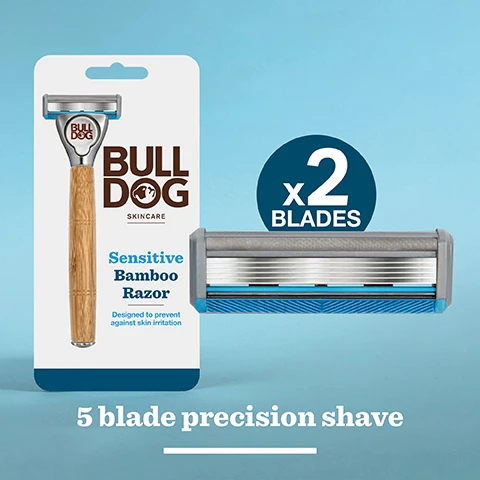 Image 3 - Image of a Bulldog Skincare Sensitive Bamboo Razor package, featuring a bamboo handle and a razor head with two blades, with text that reads Sensitive Bamboo Razor, Designed to prevent against skin irritation, and 5 blade precision shave.
Image 4 - A person shaving their face with a razor featuring a bamboo handle, and the visible text reads responsibly sourced bamboo handle.
Image 5 - Close-up of a razor with a silver handle and blue blade, featuring the text designed to prevent against skin irritation.
Image 6 - A bamboo razor package is shown with a grey towel in the background, featuring text that reads Bulldog Skincare, Sensitive Bamboo Razor, Designed to prevent against skin irritation, and Recycled & Recyclable Packaging.
Image 7 - Image shows two products from Bulldog Skincare on a light blue background: a packaging for four sensitive steel blades and a bamboo razor with a description indicating it is designed to prevent skin irritation, along with the text A quality shave responsibly crafted.