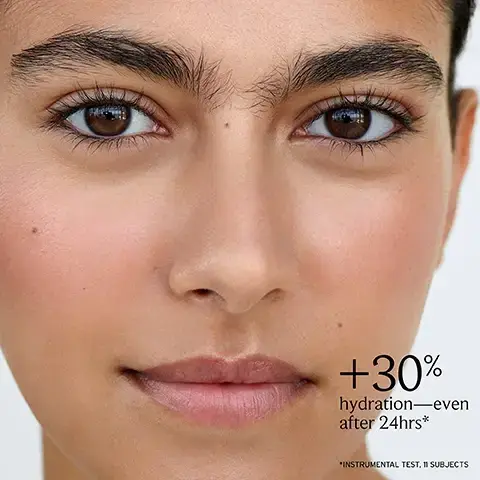 Image 1 - Close-up of a young womans face, showcasing her clear skin, brown eyes, and natural makeup, with the text +30% hydration—even after 24hrs* in the lower right corner, which also notes *INSTRUMENTAL TEST, 11 SUBJECTS.
Image 2 - Image features pink rose petals with a water droplet, accompanied by text that includes Continual drip, lasting glow, Damask rose extract strengthens skins barrier, Hyaluronic acid attracts & maintains moisture, and Time-release technology delivers continuous hydration.
Image 3 - Image shows four moisturizer products on a white background, including Lotus Youth Preserve Moisturizer, Lotus Dream Cream, Rose Deep Hydration Face Cream, and Black Tea Renewal Cream, with descriptions highlighting their benefits: Lotus Youth Preserve Smoothes texture & fine lines, Lotus Dream Cream Boosts radiance overnight, Rose Face Cream Strengthens & visibly plumps, Black Tea Renewal Cream Visibly firms & smoothes.Image 4 - Image showing four skincare products arranged vertically with the text Deep hydration ritual at the top, the products include a cleanser, toner, serum, and face cream, each labeled with its corresponding step, Step 1 Cleanse, Step 2 Tone, Step 3 Treat, Step 4 Moisturize.