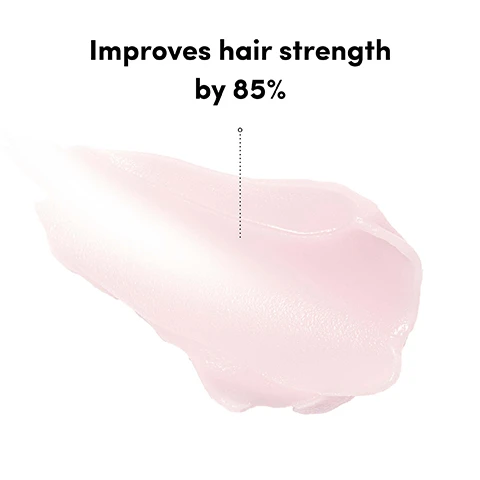 Image 1 - A smear of light pink cosmetic product with a dotted line pointing to it and the text Improves hair strength by 85%. Image 2 - A before and after image displays a womans long blonde hair, with the left side showing dry, frizzy hair labeled Before, and the right side showing smooth, shiny hair labeled After, with additional text that reads *Using Sweet Repair Shampoo, Conditioner and Mask as part of a regimen, and UNRETOUCHED. Image 3 - A pink tube of Coco & Eve Sweet Repair hair mask with product squeezed onto a halved avocado, surrounded by coconut pieces, bananas, and sliced guava on a pink background, with the text Get visibly smoother, healthier-looking locks in just 5 minutes! and on the tube COCO & EVE SWEET REPAIR REPAIRING & RESTORING HAIR MASK Biomimetic Ceramides + Hyaluronic Acid + Vegan Keratin Complex MASQUE RÉPARATEUR ET RECONSTITUANT POUR LES CHEVEUX Net 68 ml / e 2.83 fl. oz. US. Image 4 - Against a pink background, a hand squeezes white cream from a pink tube labeled Coco & Eve Sweet Repair Repairing & Restoring Hair Mask, + Ceramide + Hyaluronic Acid + Keratin Complex, Masque Réparateur et Restaurateur Pour Les Cheveux, and e 2.83 fl. oz. US, into the palm of another hand, with additional text on the left stating Repairs and restores, Helps reduce breakage and split ends, Promotes softness and smoothness for healthier looking hair. Image 5 - A smiling blonde woman in a pink bikini top holds a pink guava slice over her right eye, looking at the camera against a blue sky with clouds and a background of green trees, with the text Powered by biomimetic ceramides, hyaluronic acid and vegan keratin visible at the top.