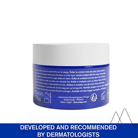 Image 1 - A blue cosmetic jar labeled 50ml with instructions in multiple languages, including Avoid contact with the eyes and Developed and recommended by dermatologists on a white background.
Image 2 - A close-up of a woman applying a white cream labeled Enveloping velvet cream on her cheek, with text indicating Fragrance-free and DAILY FRAGILIZED SKIN positioned above.
Image 3 - A product advertisement for CICA DAILY by Uriage featuring a blue background, a dropper bottle and cream jar, and two skin images labeled BEFORE and AFTER, with visible text stating Hydrate & repair the skin fragilized by daily aggressions and REPAIR IN 1 APPLICATION* DISCOMFORT REDNESS & SKIN MARKS BLEMISHES.
Image 4 - Image shows two side-by-side comparisons of skin before and after treatment, with a white triangle outlined on each side; text reads BEFORE on the left and AFTER on the right, with additional text below stating REPAIRS IN 1 APPLICATION and a note indicating clinical measurement after a single application of CICA DAILY Repairing cream concentrate.
Image 5 - An image displaying a blue jar of Uriage CICA Daily repairing cream concentrate with the text Daily Bandage Effect, repairs and hydrates in 1 application, reinforces skins barrier, and a label indicating 96% of natural origin ingredients.
Image 6 - Image shows a graphic titled ADVANCED DERMATOLOGICAL FORMULA with sections detailing benefits of ingredients: CENTELLA ASIATICA - Repairs & protects skin, Powerful antioxidant; HYALURONIC ACID & VITAMIN B5 - Repair, plump up, soothe skin; CERAMIDES - Restructure & protect skin from external aggressions; 10.5% THERMAL-BIOTIC COMPLEX - Uriage Thermal Water & Inulin, Strengthen the physical and immune barrier & rebalance microbiome barrier.
Image 7 - An infographic with a blue sky and snow-capped mountains shows text that reads Developed and recommended by dermatologists, Suitable for fragilized skin, Fragrance-free, High-tolerance, and 96% ingredients of natural origin, accompanied by relevant icons.
Image 8 - A smiling dermatologist wearing glasses and a white lab coat stands in front of a plain background, with visible text stating Urban pollution can damage the skin and its microbiome. Using gel-creams with prebiotic natural substances effectively protect the skin and Dr. Karan Lal, Dermatologist.
Image 9 - A blue serum bottle with a dropper labeled CICA DAILY Sérum réparateur intense is shown next to a blue jar labeled CICA DAILY Concentre de crème réparateur, with accompanying text indicating steps for use: 1 Intense repair and 2 Hydrate & repair.
Image 10 - A blue jar of Uriage CICA Daily repairing cream with a white lid and a label that reads CICA DAILY, along with a badge stating RECOMMENDED BY DERMATOLOGISTS and the text in French, Concentré de crème réparateur.