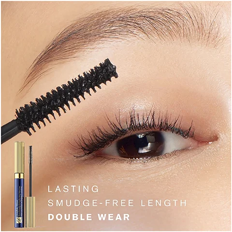 Image 1 - A close-up of an eye with long, dark eyelashes being enhanced by a mascara brush, accompanied by the products packaging and the text LASTING SMUDGE-FREE LENGTH DOUBLE WEAR.