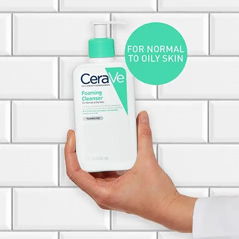 Image 1 - A hand holds a bottle of CeraVe Foaming Cleanser against a white tiled background, with a green circle displaying the text FOR NORMAL TO OILY SKIN.
Image 2 - A hand holding a white bottle of CeraVe Foaming Cleanser on a bright teal background, with text highlighting its features: removes dirt and excess oils without disrupting the skin barrier, refreshing gel to foam texture, and enriched with hyaluronic acid and niacinamide.
Image 3 - Image shows three skincare products from CeraVe arranged on a light surface with a water-like texture; the products are labeled PROTECT, HYDRATE, and CLEANSE, with descriptions indicating their functions.