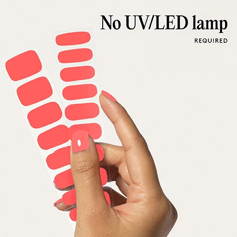 Image 1 - A hand holds bright red nail polish strips with nails painted the same color next to the text No UV LED lamp REQUIRED. Image 2 - Two bright coral artificial nails are shown with the text 100% real salon-quality gel. Image 3 - Close-up of a hand with coral pink nails touching lips with dark pink lipstick, with text that reads Lasts up to 14 days. Image 4 - A hand with coral fingernails and the text 1 minute removal NO DAMAGE. Image 5 - Illustration shows a four-step guide for applying nail wraps titled Step by step with illustrations for 1 Prep, 2 Stick & Wrap, 3 Trim & File, and 4 Remove. Image 6 - A strip of red nail polish stickers is shown below a list of features: Easiest and gentlest mani in the world, Lasts up to 14 days, Fast & gentle 1-min removal, Fully-cured - No LED Lamp required, Comes in 10 sizes, Long-lasting shine and chip-resistant, Quick and easy application, Hema-free, vegan, and cruelty-free, Pre-cut and ready to go!