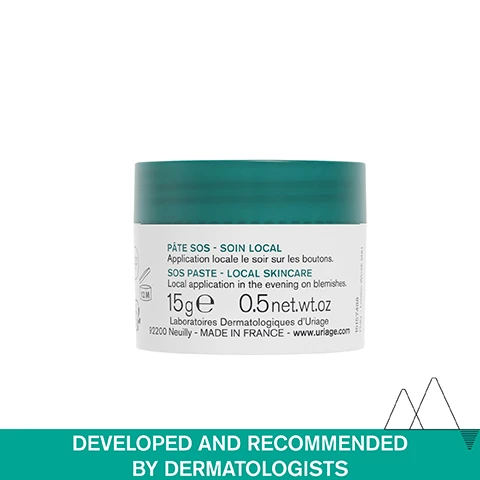 Image 1 - Image of a small jar of skincare paste with a teal lid, featuring labels in French and English that describe its use for local application on blemishes, along with the text developed and recommended by dermatologists.
Image 2 - A close-up of a womans face showing her chin with two small droplets of thick green clay and her fingers gently touching her skin, accompanied by the text OILY SKIN PRONE TO BLEMISHES, Thick green clay texture, and Local care.
Image 3 - A close-up image of a jar labeled SOS Anti-Blemish Paste with Tea Tree showing a teal lid and text indicating -56% Blemish Size* and Accelerates Blemishes Maturation.
Image 4 - An infographic titled Advanced Dermatological Formula contains four sections, each describing an ingredient: Tea Tree, which accelerates spot maturation; Green Clay, which dries out spots; Zinc, which regulates the overproduction of sebum with purifying properties; and Uriage Thermal Water, which is 100% pure and natural, softens and soothes all skin types.
Image 5 - A scenic view of snow-capped mountains under a blue sky features three icons and text that states Developed and recommended by dermatologists, Suitable for acne-prone skin, and High-tolerance.
Image 6 - Image shows four skincare products from URIAGEs HYSEAC line on a light background, with labels indicating steps for a skincare routine: 1 Cleanse, 2 Correct, 3 Local day care, and 4 Local night care; the visible products include a cleansing gel, a corrective skin treatment, and a drying gel.
Image 7 - A green and white jar of Uriage Hyseac SOS Paste with a small amount of cream on the side, featuring a blue circular badge that reads recommended by dermatologists.