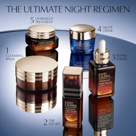 Five Estee Lauder skincare products are arranged on a reflective surface, presented as THE ULTIMATE NIGHT REGIMEN, and include: 1 Cleansing Balm Estee Lauder Advanced Night Repair Cleansing Balm; 2 The Eye Lift Estee Lauder Advanced Night Repair Eye Lift + Sculpt; 3 Repair Serum Estee Lauder Advanced Night Repair Synchronized Multi-Recovery Complex; 4 Night Creme Estee Lauder Revitalizing Supreme+ Night Power Bounce Creme; and 5 Overnight Treatment Estee Lauder Advanced Night Repair Overnight Treatment.