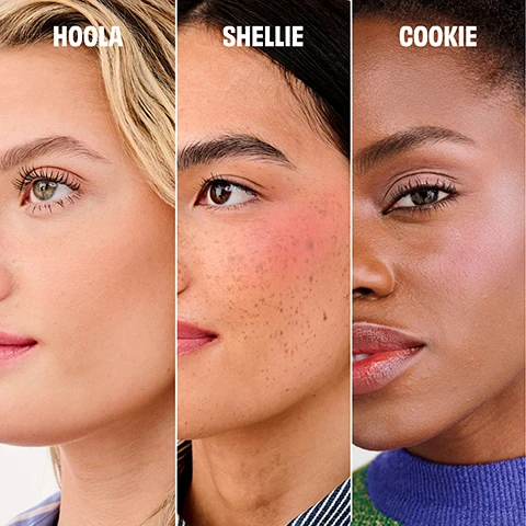 Image 2 - Close-up of three womens faces, each featuring a different makeup shade on their cheek, labeled HOOLA, SHELLIE, and COOKIE. Image 3 - Three distinct piles of cosmetic powder are shown on a white background: brown powder with the text HOOLA, reddish-orange powder with the text SHELLIE, and light pink powder with the text COOKIE. Image 4 - A close-up of a womans face in profile looking left, featuring her nose, full pink lips, and green eye with long dark lashes, with blonde hair visible on the right, and the text Model is wearing Hoola Original. Image 5 - A close-up of a models face with brown eyes looking left, dark eyebrows, freckles, rosy pink blush on her cheek, glossy pink lips, and a small golden stud earring, with the text MODEL WEARS SHELLIE BLUSH. Image 6 - Close-up of a womans face, her skin glowing with makeup, wearing an earring, with the text Model Wears Cookie Highlighter.
