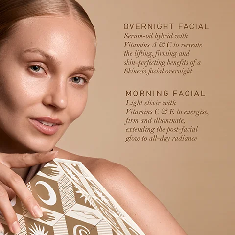 A woman with radiant skin holds a patterned box, alongside text detailing OVERNIGHT FACIAL Serum-oil hybrid with Vitamins A & C to recreate the lifting, firming and skin-perfecting benefits of a Skinesis facial overnight and MORNING FACIAL Light elixir with Vitamins C & E to energise, firm and illuminate, extending the post-facial glow to all-day radiance.